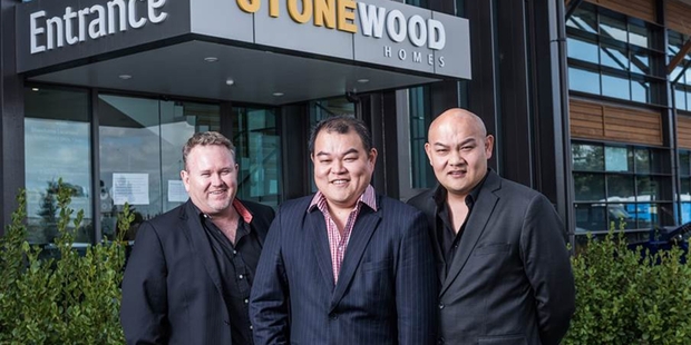 John (middle) and Michael Chow (left).