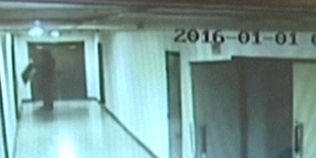 Loading CCTV footage shows the moment the US student stole a banner with a political slogan. Photo / Supplied