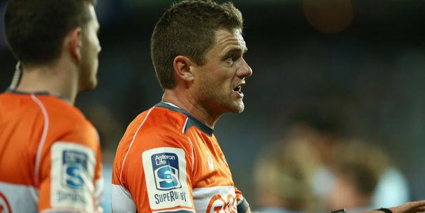 Referee Nick Briant calls for the TMO. Photo / Getty