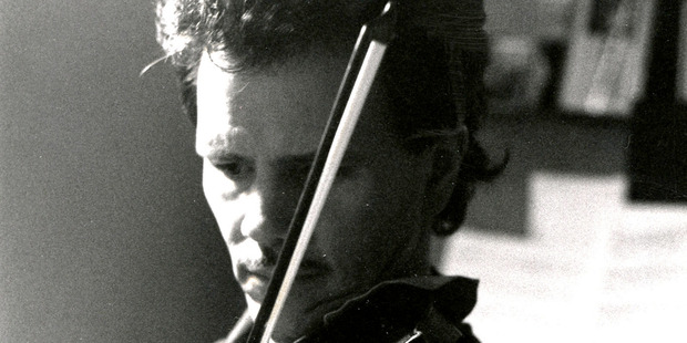 Phil Johnson, playing the Stradivarius, 1994. Photo / Thanh Tran