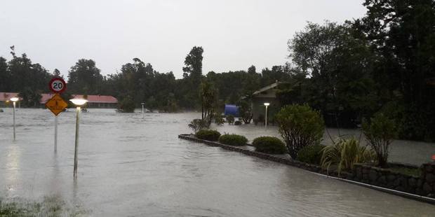 Flooding in Franz Josef. Photo / Nicolaas Bester