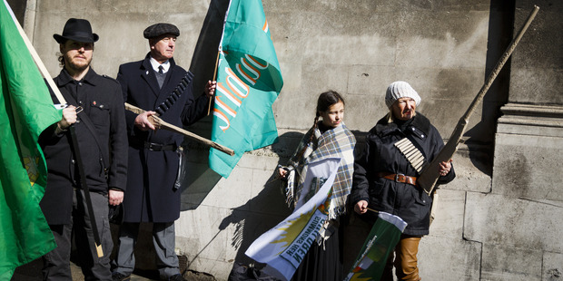 People dressed in historical costumes from the 1916 Easter Rising. Photo / AP