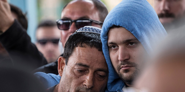 Family and friends mourn during the funeral of Simha Damarib 60, one of three Israelis killed in a suicide bomb attack in Istanbul, Turkey, in Dimona, southern Israel on Tuesday. Photo / AP