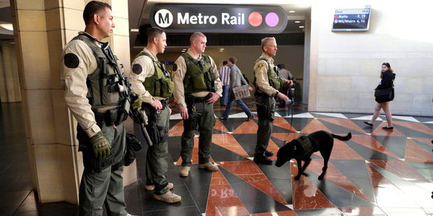 Members of Los Angeles County Sheriff's Department patrol at Union Station in Los Angeles, after the terror attacks in Brussels. Photo / AP