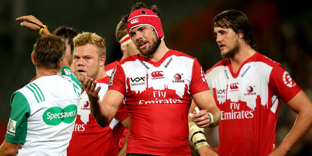 Warren Whiteley of the Lions argues with referee Chris Pollock. Photo / Getty