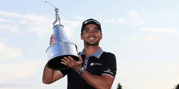 Jason Day poses with the trophy at the Arnold Palmer Invitational. Photo / Getty Images