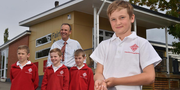 Wasp attack victim Daniel Wheeler (front, 9), of Fairfield School, shows the results of the stings yesterday, with fellow campers behind him. Photo / Otago Daily Times / Gregor Richardson