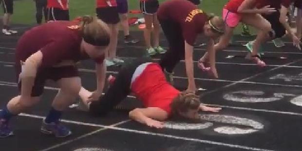 The video shows Kroge, 14, brutally face-planting twice in the opening 10m of a running race. Photo / Twitter.