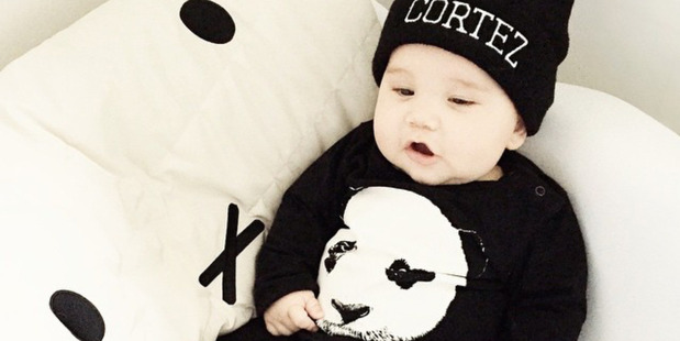 Cortez Paewai, pictured at 6 months on Instagram, is an unsuspecting model for a copy of the panda onesie he wears. Photo / fromlondontobrooklyn