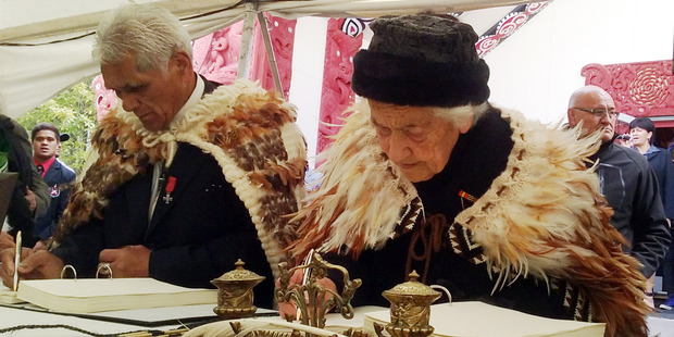 Jerry Hapuku and Te Ahi Ahi sign the Heretaunga Tamatea Deed of Settlement. Photo / Hawkes Bay Today