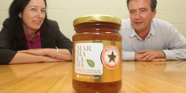 Sally Duckworth and Alisdair Ross with a gold-medal winning marmalade from last year. PHOTO/ANDREW BONALLACK