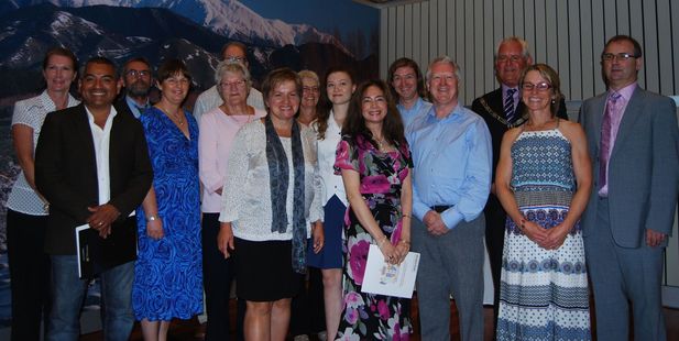 NEW NEIGHBOURS: Rowanne Bowden, Marvin Guerrero Munoz, Jaroslav Pretak, Christine Arcus, Celia Holt, John Henry (obscured), Kat Pretak, Lesley Wright, Erin Charnock, Judith Lee, Kieran Charnock, Andrew Charnock, Mayor John Booth, Pernille Booth and Steven Lee.PHOTOS/ALISA YONG
