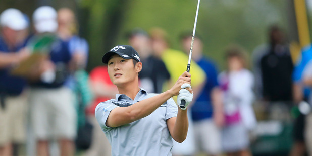 Danny Lee plays a shot to the first green during the first round of the World Golf Championships-Dell Match Play. Photo /Getty