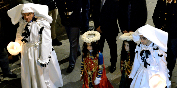A Holy Week procession in Iglesias, Sardinia. Photo / iStock