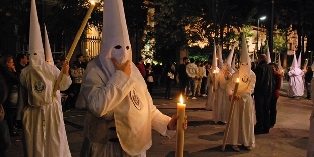 Members of the Candelaria brotherhood during Santa Semama, in Seville. Photo / iStock