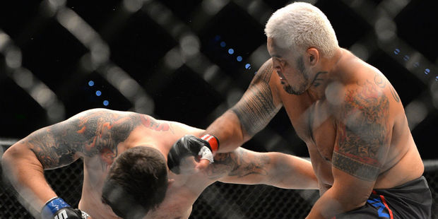 Mark Hunt delivers the knock out punch against Frank Mir during their UFC Heavyweight Bout at UFC Brisbane. Photo / Getty