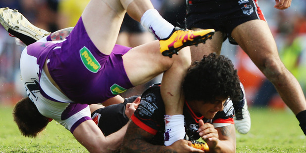 James Gavet of the Warriors tackles Cameron Munster. Photo / Getty