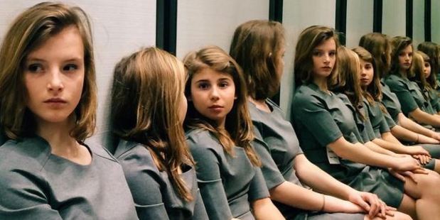An image posted to Instagram by Swiss photographer Tiziana Vergari shows two girls reflected into mirrors making it as though there are dozens of girls in the frame. Photo: Tiziana Vergari/Instagram