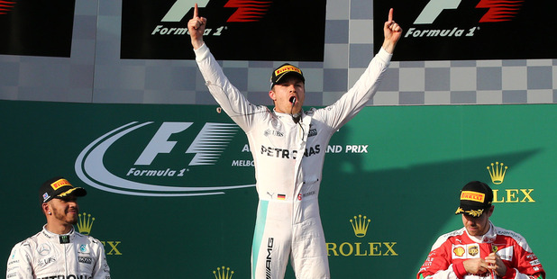 Mercedes driver Nico Rosberg celebrates on the podium after winning the Australian Formula One Grand Prix. Photo / AP