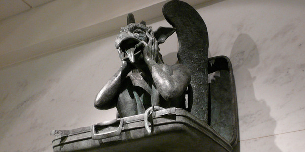 A gargoyle in a suitcase at Denver International Airport. Photo / K W Reinsch, Flickr