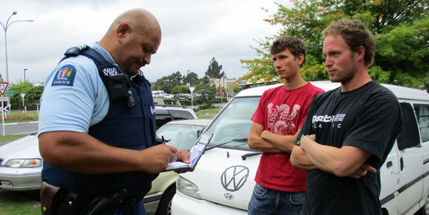 Sergeant Te Reipa Morunga (left) with Jan Meinke, 20, and Felix Regner, 27, who earned praise for their efforts to help a German man who died on the Tongariro Alpine Crossing. PHOTO/DEE WILSON