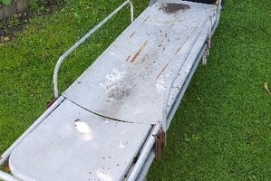 The old stretcher, which belonged to former St John ambulance officer Peter Gibson, has been listed on Trade Me with all funds being donated to St John Napier.