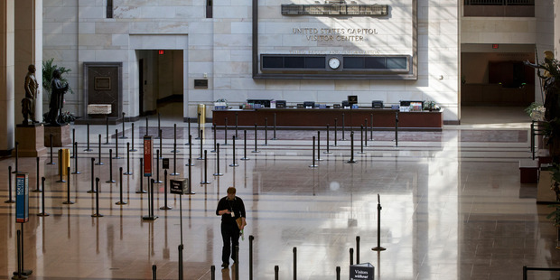 The cavernous Capitol Visitor's Centre is empty following a shooting at the entrance on Capitol Hill in Washington. A gunman was taken into custody after firing shots. Photo / AP