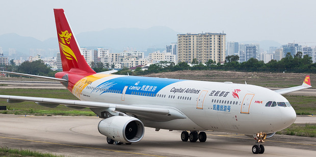 The plane was evacuated just before takeoff, after a passenger spotted a flat tyre. File photo / YBen, Wikimedia Commons