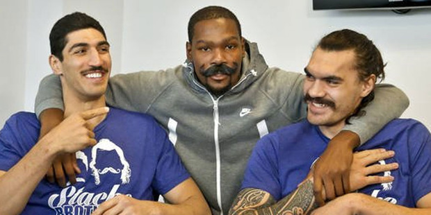 Oklahoma Thunder's Kevin Durant (c) gate crashes an interview with Steven Adams (r). Photo / Twitter.