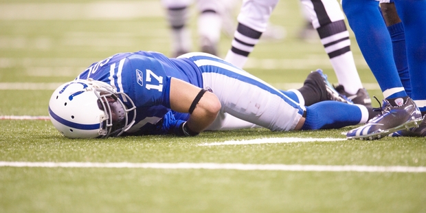 Indianapolis Colts Austin Collie down on field with concussion during injury vs Jacksonville Jaguars at Lucas Oil Stadium. Photo / Getty