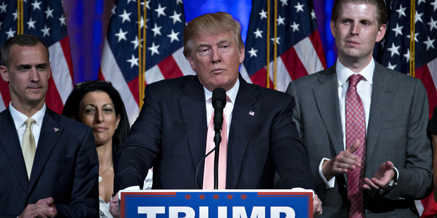 Lewandowski with the man he hopes to make president. He is extremely loyal to his boss, always refering to him as "Mr Trump". Photo / Getty Images