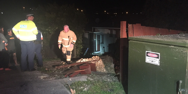 Fire and police attend the scene. Photo / Scott Yeoman