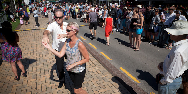 A couple dancing near one of the multiple stages at the Downtown Carnival on the Strand on Saturday. Photo / Andrew Warner