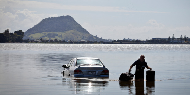 Car crashes into Tauranga Harbour on SH2 Takatimu Drive.