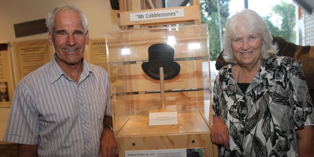Cobblestones Trust chairman Graeme Gray, left, and Wendy Croton remember Graham Croton with a memorial display centred around his top hat at the Cobblestones Museum in Greytown. PHOTO/ANDREW BONALLACK