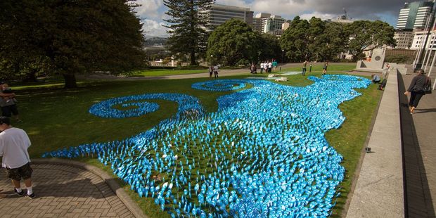 Thousands of blue paper water drops were arranged to form a river at the steps of Parliament this week. PHOTO/BEN SARTEN