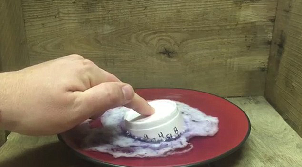 The video shows foam cups melting as soon as they touch the acetone.