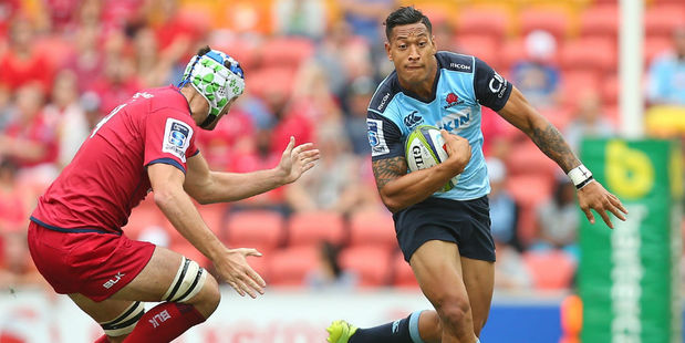 Israel Folau on the burst against the Reds. Photo / Getty