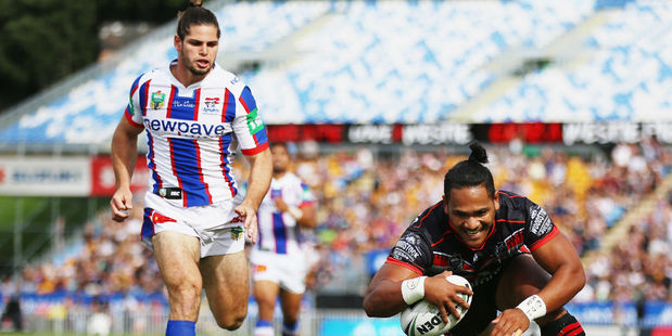 Solomone Kata scores against the Newcastle Knights. Photo / Getty