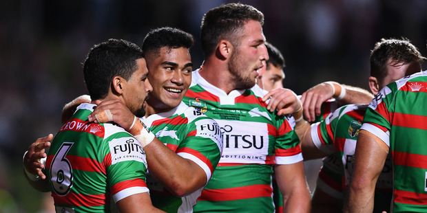 Cody Walker of the Rabbitohs is congratulated after scoring a try. Photo / Getty