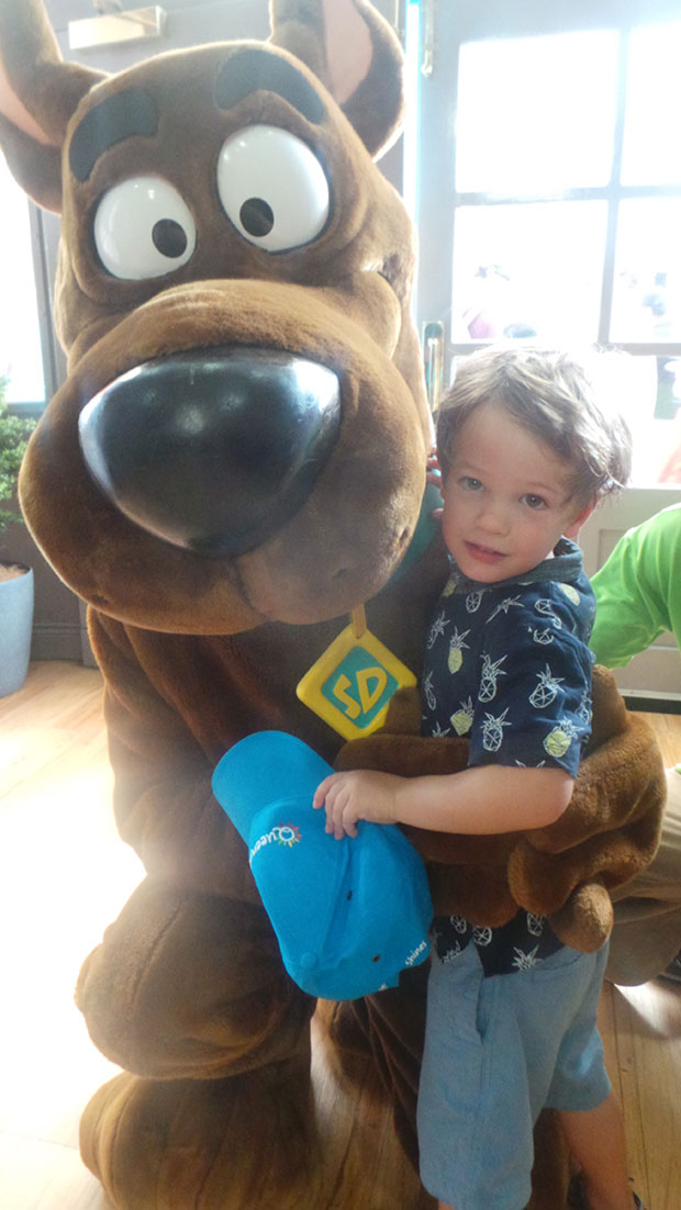 Baxter with Scooby Doo at Movie World. Photo / Winston Aldworth