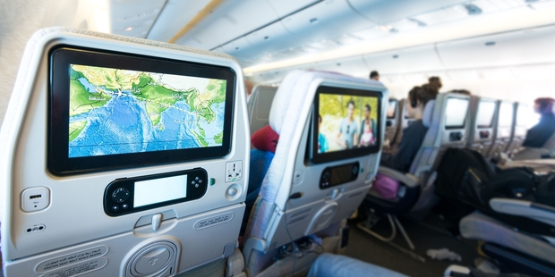 If you don't fork out for entertainment on certain airlines, you might have to spend your whole journey watching the flight path. Photo / 123RF