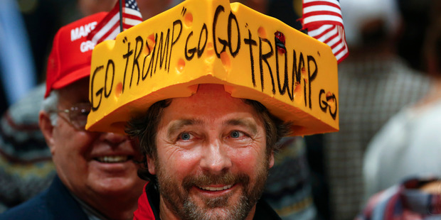Charlie Wicka listens to Republican presidential candidate Donald Trump speak in La Crosse. Photo / AP