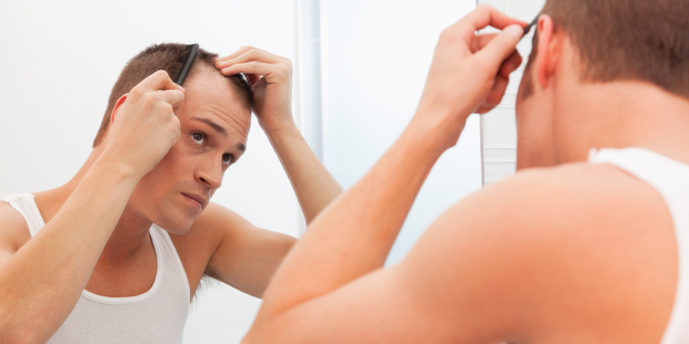 Scientists have found a way to grow complex skin cells, complete with hair, and plant them on skin. Photo / Getty