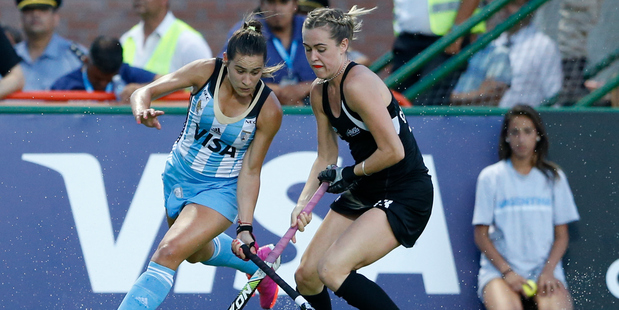 Samantha Charlton fights for the ball against Argentina. Photo / Getty Images