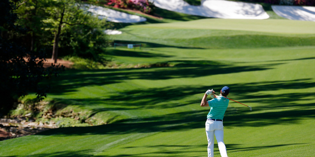 Jordan Spieth hits a shot during a practice round prior to the start of the 2016 Masters. Photo / Getty Images