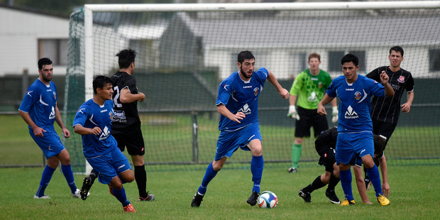 Tauranga City United centre back Sam O'Regan on the ball during the loss to Birkenhead United on Sunday. Photo / George Novak