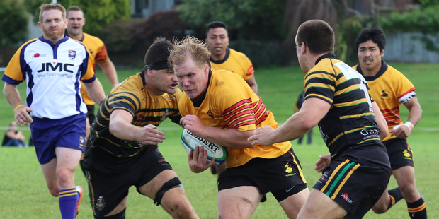 Te Puke Sports player Grayden Sheres takes the ball up against Greerton Marist in Saturday's 39-36 thriller. PHOTO/RICK MORAN