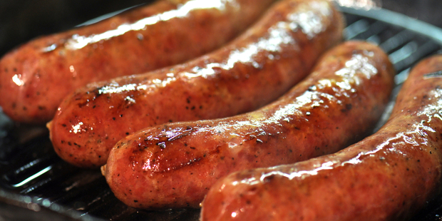 Sausages provoked a scrap at a Daimler meeting. Photo / iStock