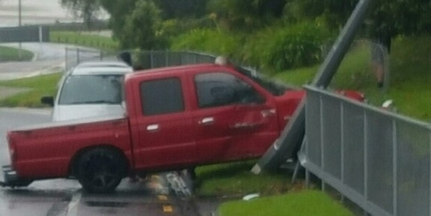 A ute has crashed into a fence on Fraser Rd in Tauranga. Photo/supplied
